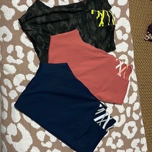 Three pairs of Fabletics 7/8 leggings